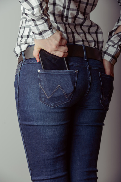 smartphone in the pocket of jeans - Fotoğraf, Görsel