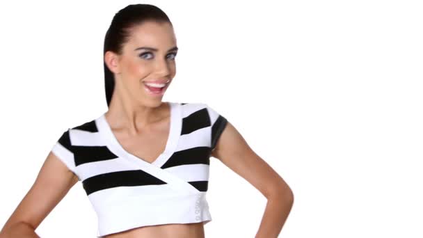Young beautiful and sporty woman on white background - Filmati, video