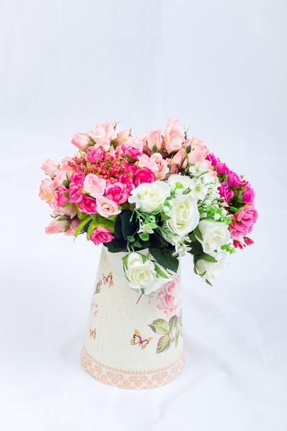 Giuggiola.fiori vintage in vaso vintage su sfondo bianco
. - Foto, immagini