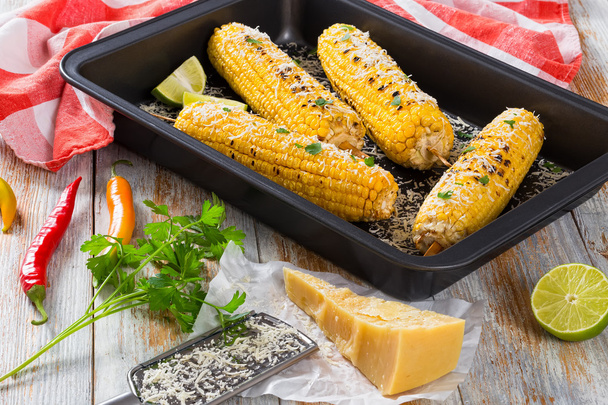 Grilled corn in dish, view from above, close-up - Фото, изображение