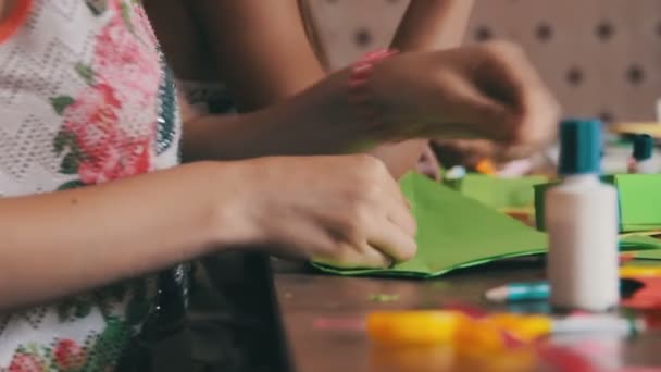 Children Make Crafts Out of Paper at the Table, HandMade - Video