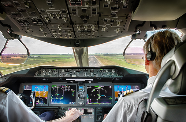 Pilot and copilot in commercial plane - Фото, изображение