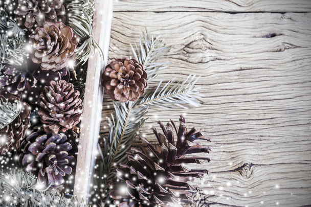 Christmas decoration of pine cones in wooden box - Zdjęcie, obraz
