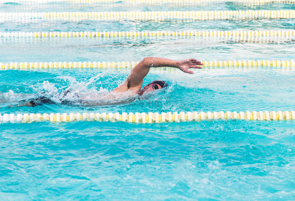 Athletic swimming compete front crawl - Photo, Image