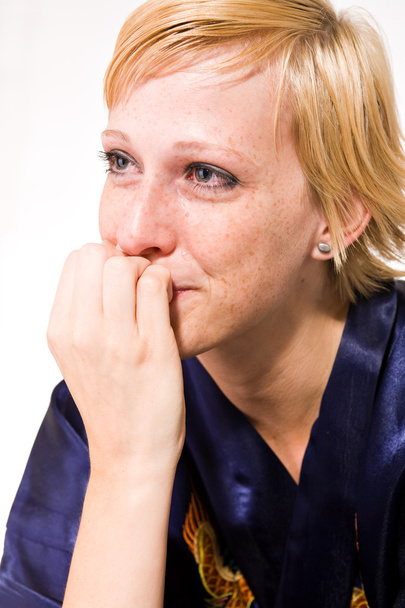 Blond girl with short hair in tears - Фото, изображение