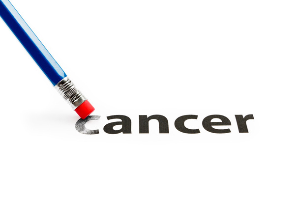 Eraser deleting the word Cancer - Photo, image