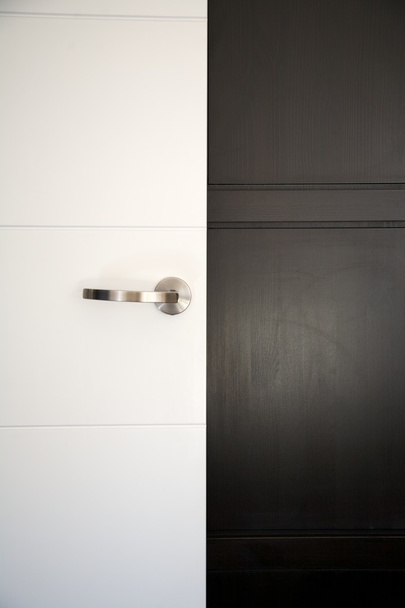 white and black doors - Foto, Bild