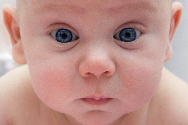 Surprised baby with blue eyes - Φωτογραφία, εικόνα