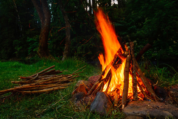 Campfire on the bank of the river - Photo, Image