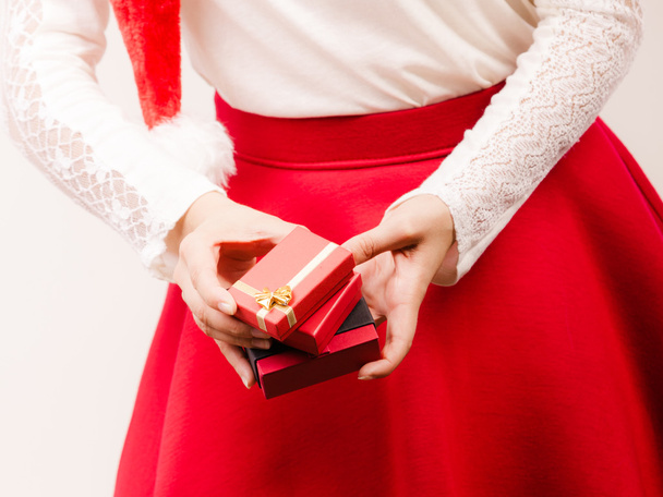 Woman with gifts. Christmas. - Zdjęcie, obraz