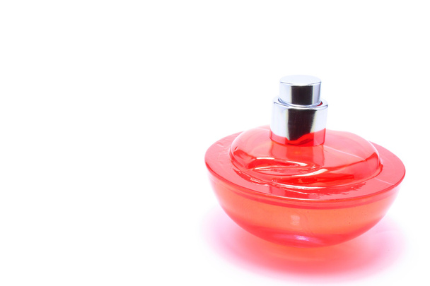 red glass bottle with perfume - Φωτογραφία, εικόνα