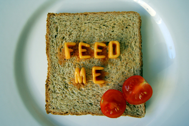 Feed me woorden op toast - Foto, afbeelding