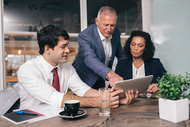 business people talking together over tablet - Φωτογραφία, εικόνα