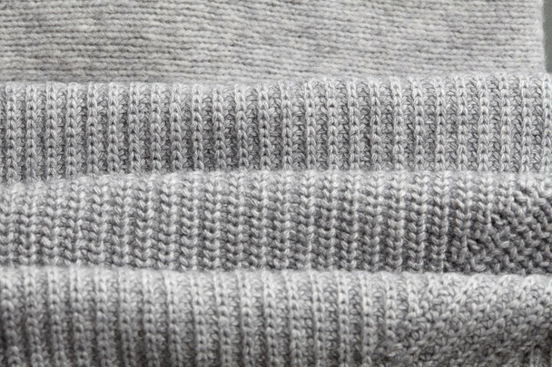 Close up of folded white knitwear - 写真・画像