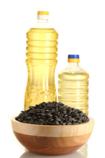 sunflower oil with sunflower seeds isolated on white background - Valokuva, kuva