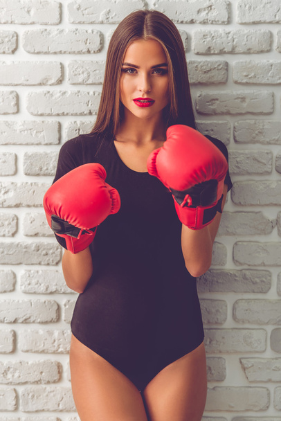 Girl in boxing gloves - 写真・画像