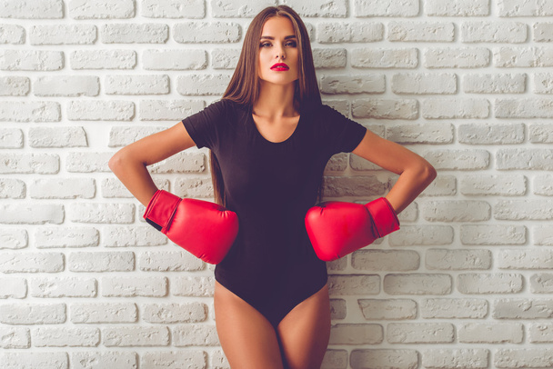 Girl in boxing gloves - 写真・画像