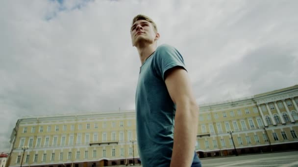 Close up portrait of a man looking away in Palace Square - Footage, Video