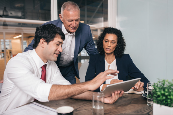 business people talking together over tablet - Photo, Image