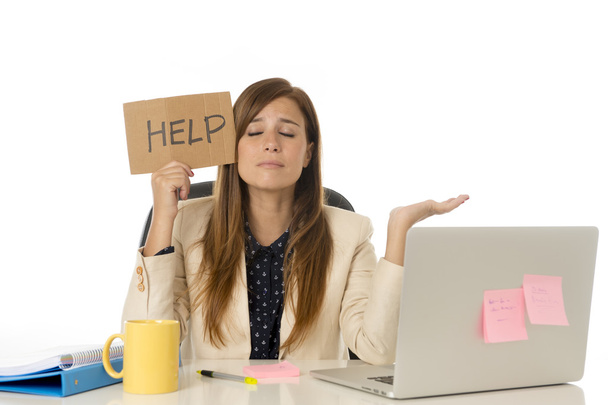 sad desperate businesswoman in stress at office computer desk holding help sign - Foto, afbeelding