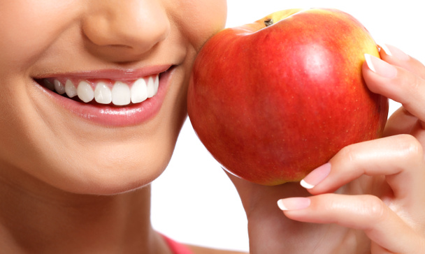 Egészséges fogak és a piros Alma - Fotó, kép