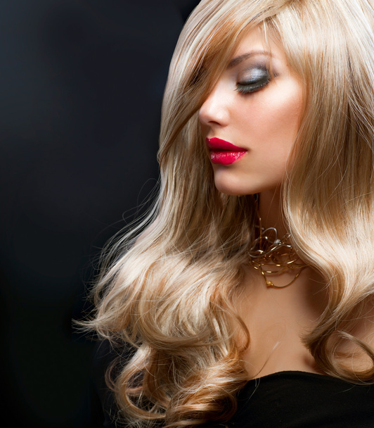 Blond Hair. Beautiful Blond Woman over Black - Valokuva, kuva
