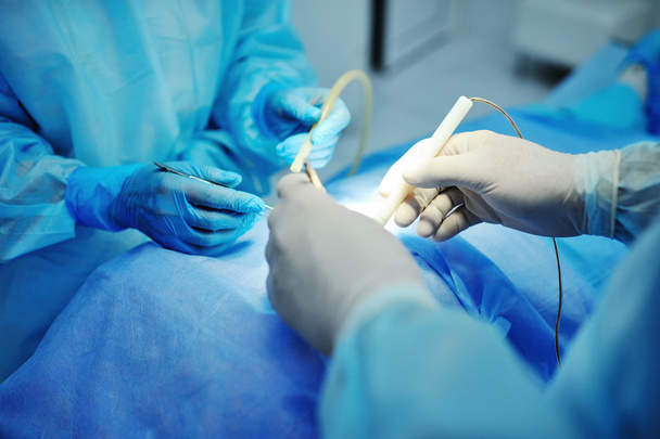 surgeons do surgery - Foto, Bild