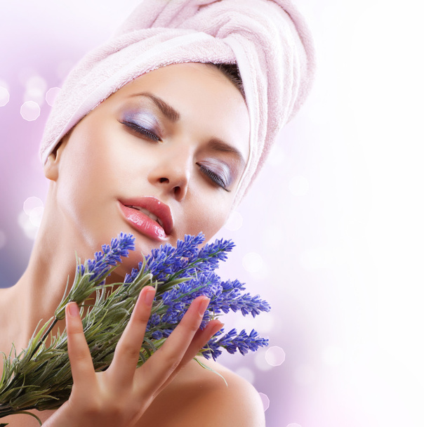 Spa Girl with Lavender Flowers. Beautiful Young Woman After Bath - Φωτογραφία, εικόνα
