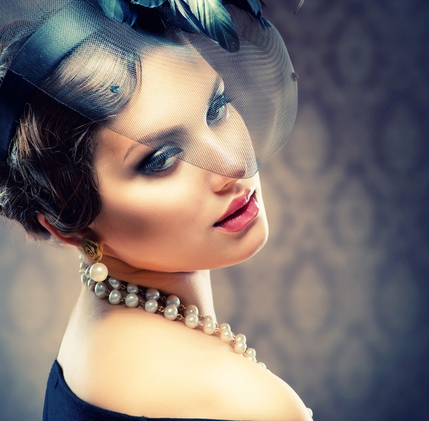 Retro Beauty Portrait. Vintage Styled. Beautiful Young Woman - 写真・画像