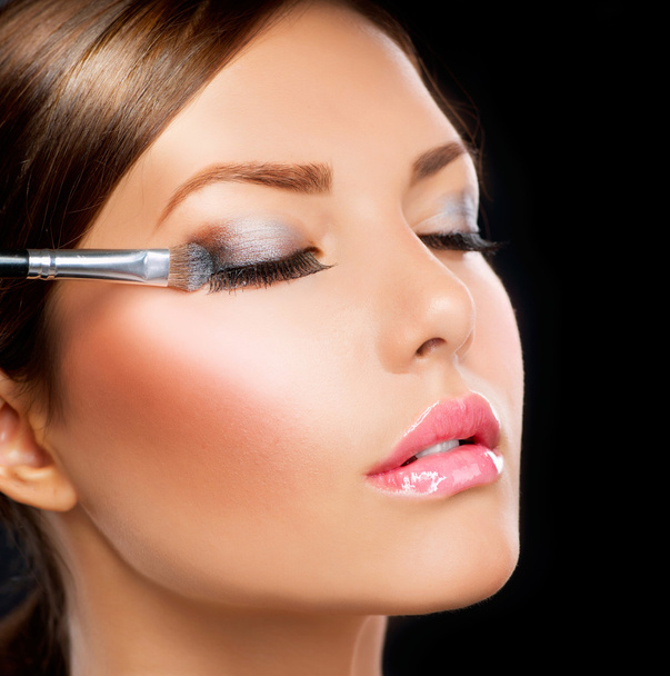 Make-up applying. Eye shadow brush - 写真・画像