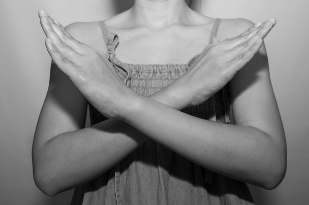  woman making X sign with her arms to stop doing something. - Fotoğraf, Görsel