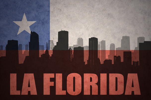 abstract silhouette of the city with text La Florida at the vintage chilean flag - Photo, Image