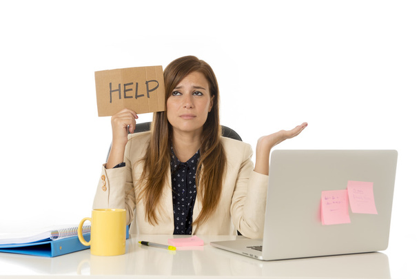 sad desperate businesswoman in stress at office computer desk holding help sign - Fotó, kép