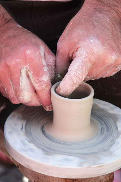 hardworking hands of the potter 3 - 写真・画像