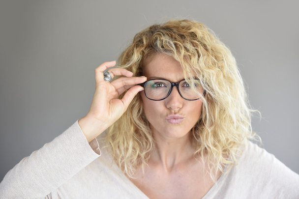 woman with eyeglasses on being expressive - Foto, Imagen
