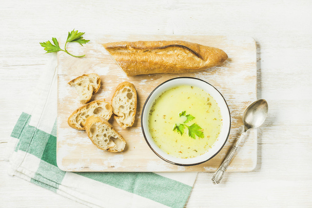 Green vegetable soup with parsley and baguette - Fotoğraf, Görsel
