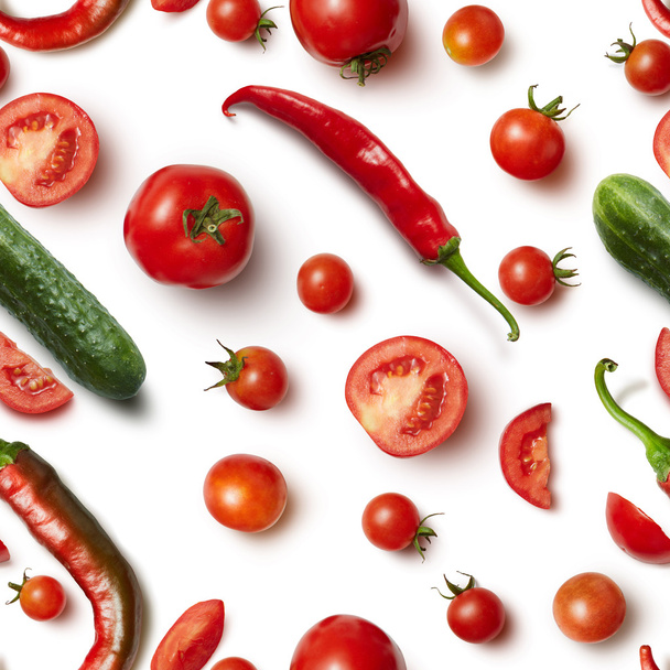 Red chili pepper, cucumber and tomato on white background . - Foto, afbeelding