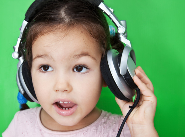Asian girl listening to music - Photo, Image