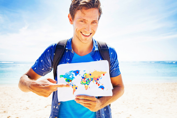 man with map on beach - Photo, Image