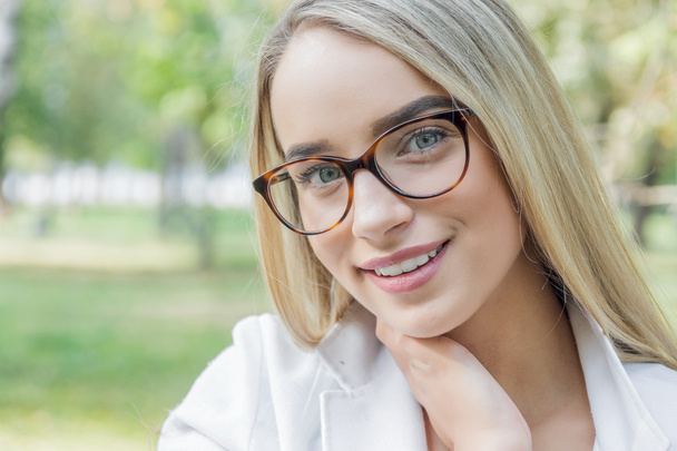 young woman in glasses - Фото, изображение