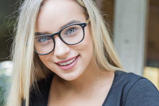 young woman in glasses - Zdjęcie, obraz