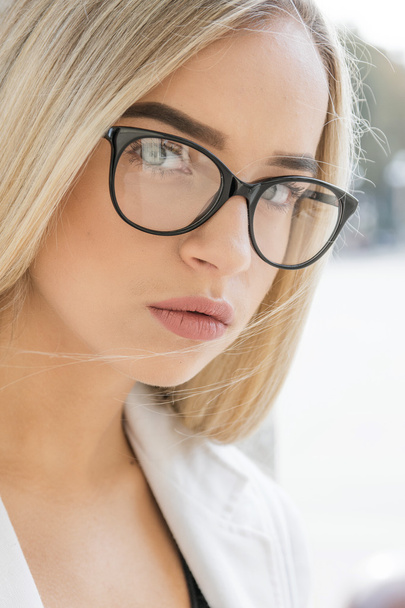 young woman in glasses - 写真・画像