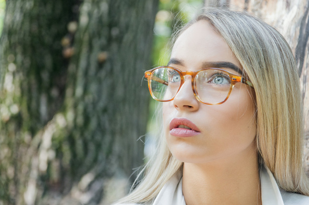 young woman in glasses - 写真・画像