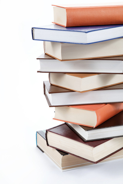 A stack of books on a white background. - Фото, изображение