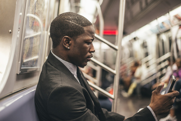 Handsome businessman in subway - Foto, Imagen
