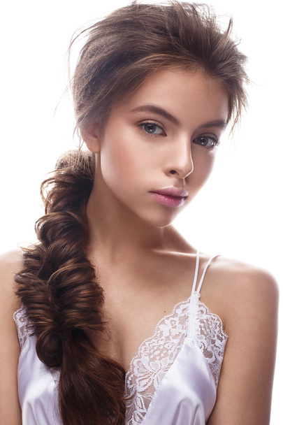 Beautiful girl in image of bride with plait. Model with nude makeup and silk underwear. Beauty face. - Foto, immagini