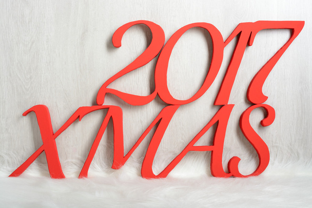 El número 2017 y la palabra XMAS en rojo
 - Foto, Imagen