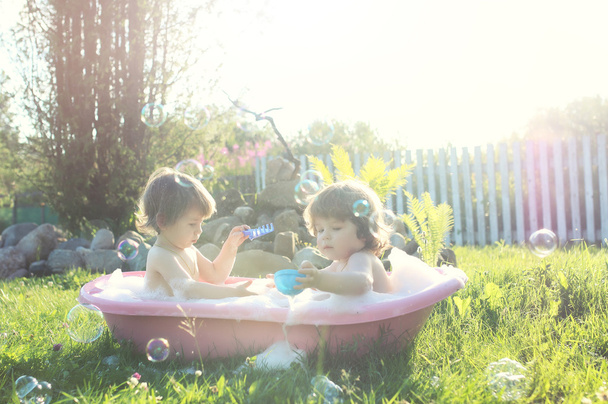 kids in bath water outdoor - Photo, Image