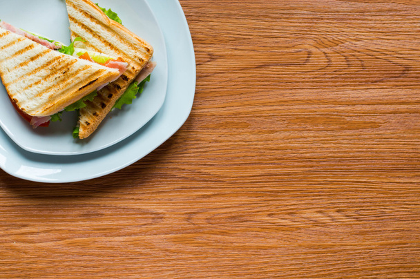 Top view of Healthy Sandwich toast on a wooden background - Valokuva, kuva