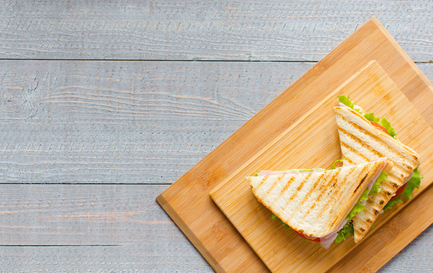 Top view of Healthy Sandwich toast on a wooden background - Fotó, kép